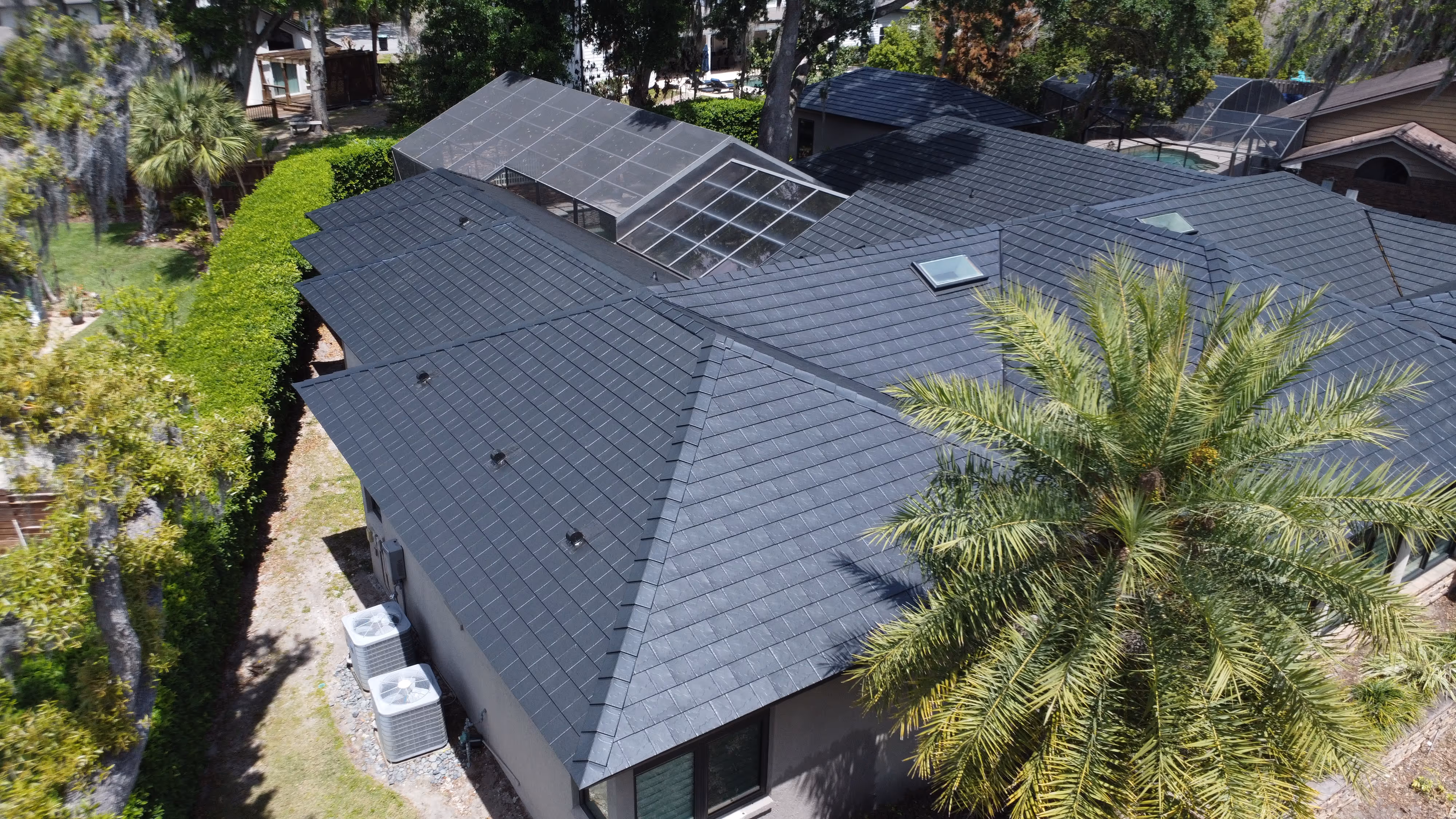 A Florida home finished with a completed Metlok slate-profile metal roof