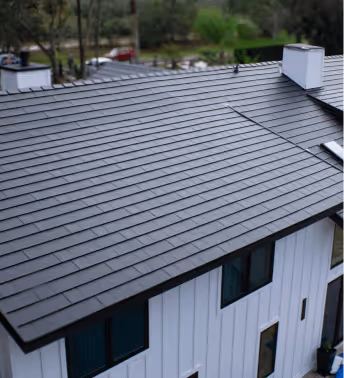 Home with a dark metal roof